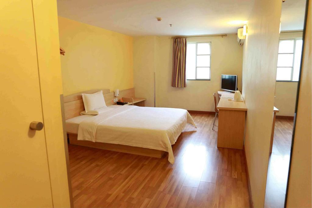 7Days Inn Taizhou Nantong Road Zhongjia Room photo